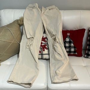 Straight leg jeans ripped on the front